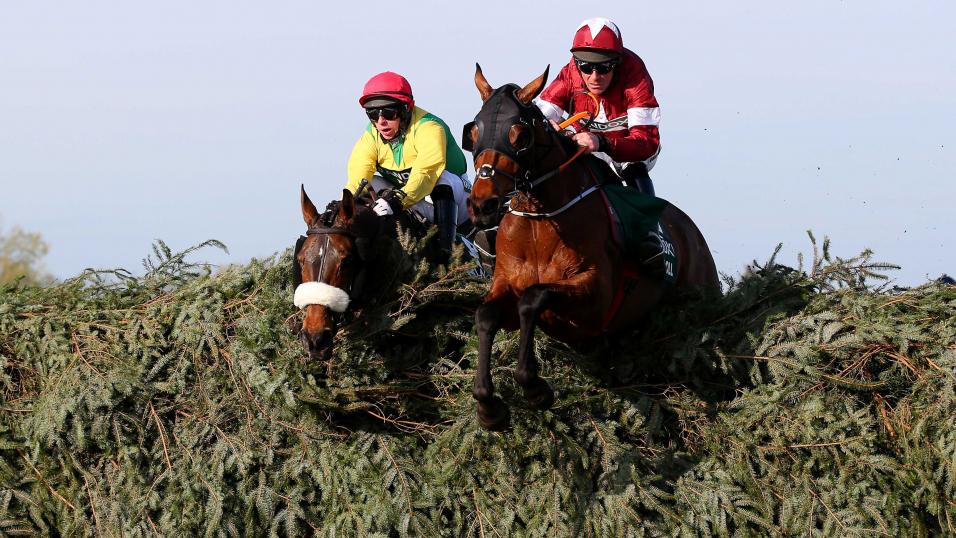 Tiger Roll jumping Grand National fence